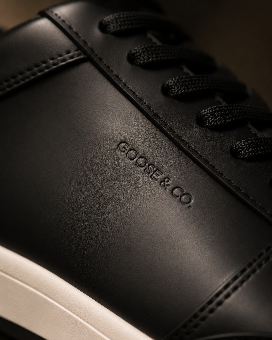 Macro detail of premium leather stitching and seam construction.